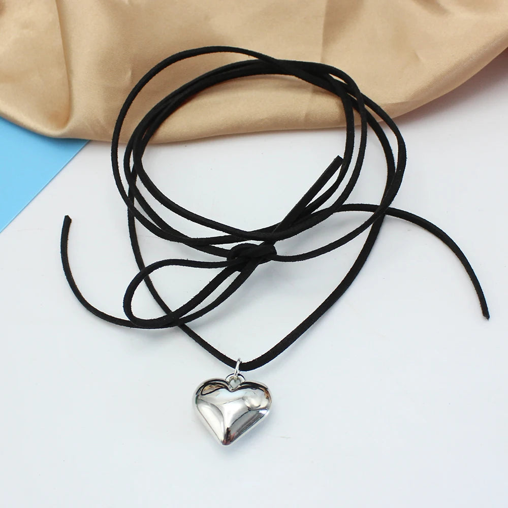 Unleash your inner goth with this stunning Black Velvet Heart Pendant Choker