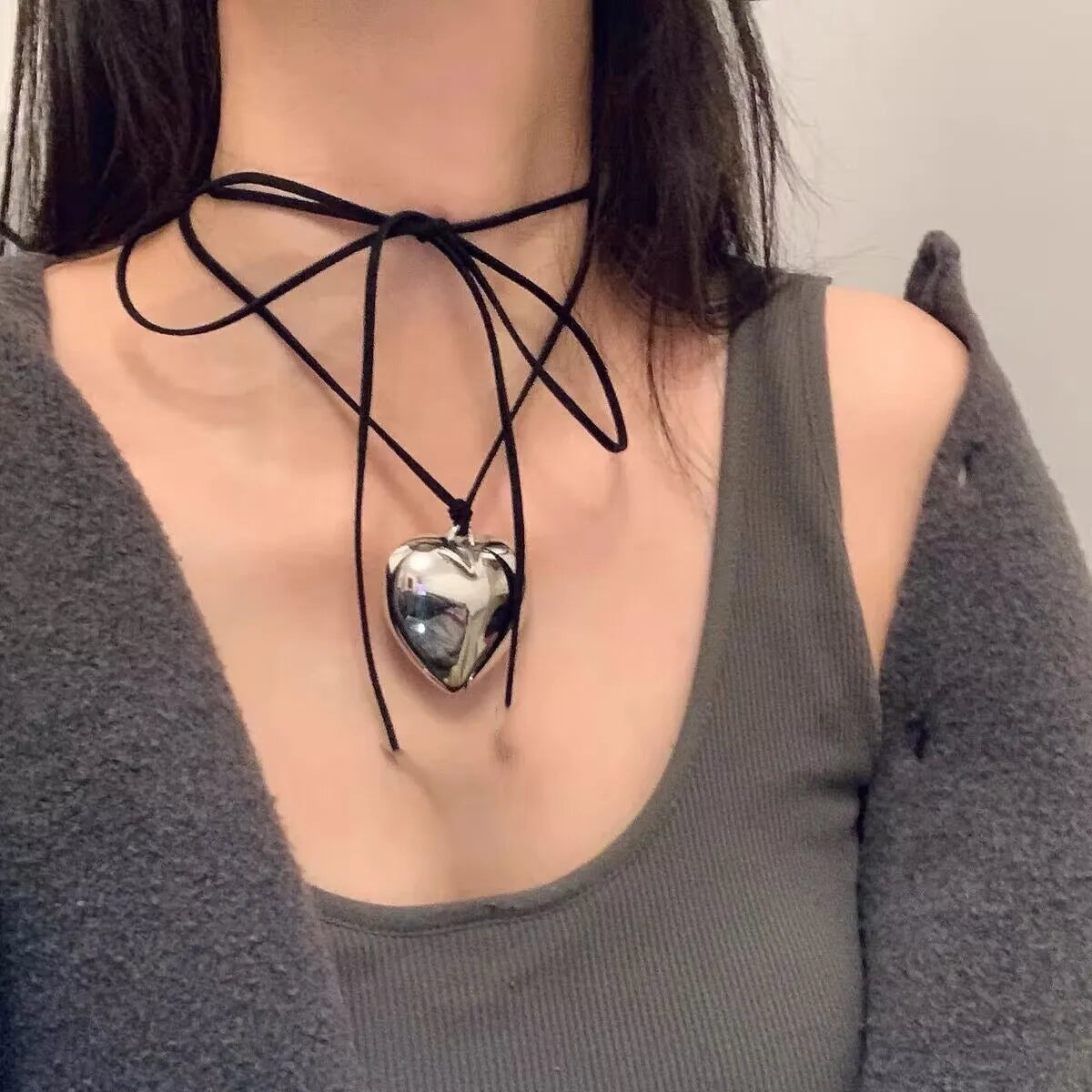 Unleash your inner goth with this stunning Black Velvet Heart Pendant Choker