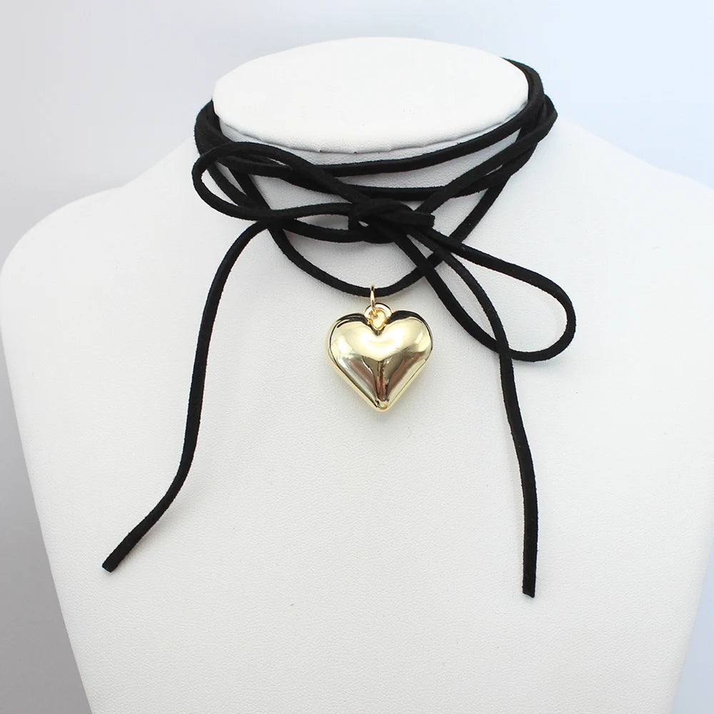 Unleash your inner goth with this stunning Black Velvet Heart Pendant Choker