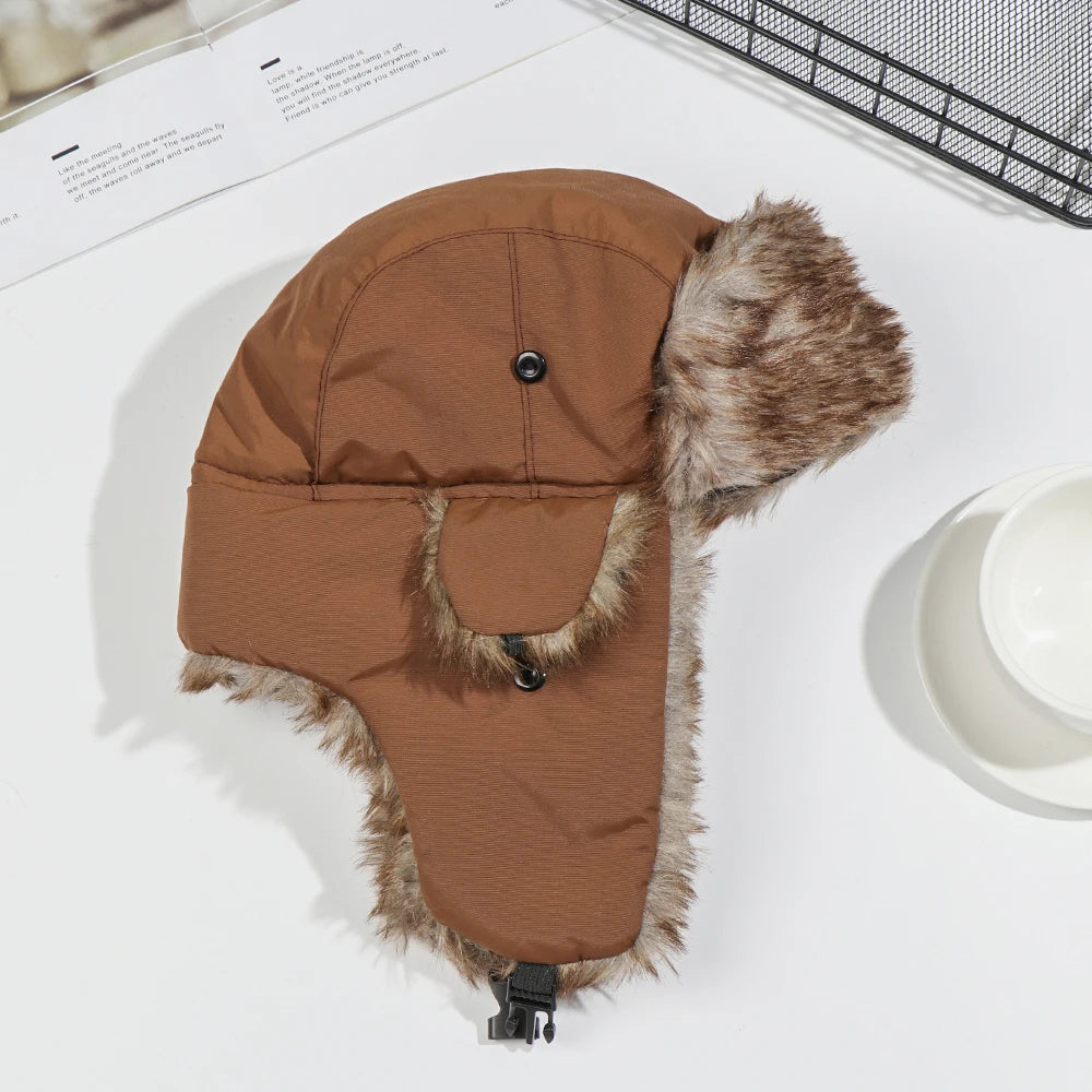 Brave the cold in style with our Trapper Bomber Hat, ideal for men and women alike